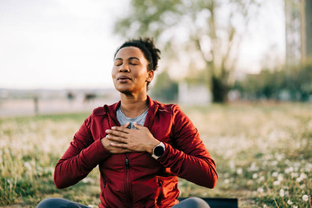 woman, breath and hand on chest, for meditation and wellness being peaceful to relax. 